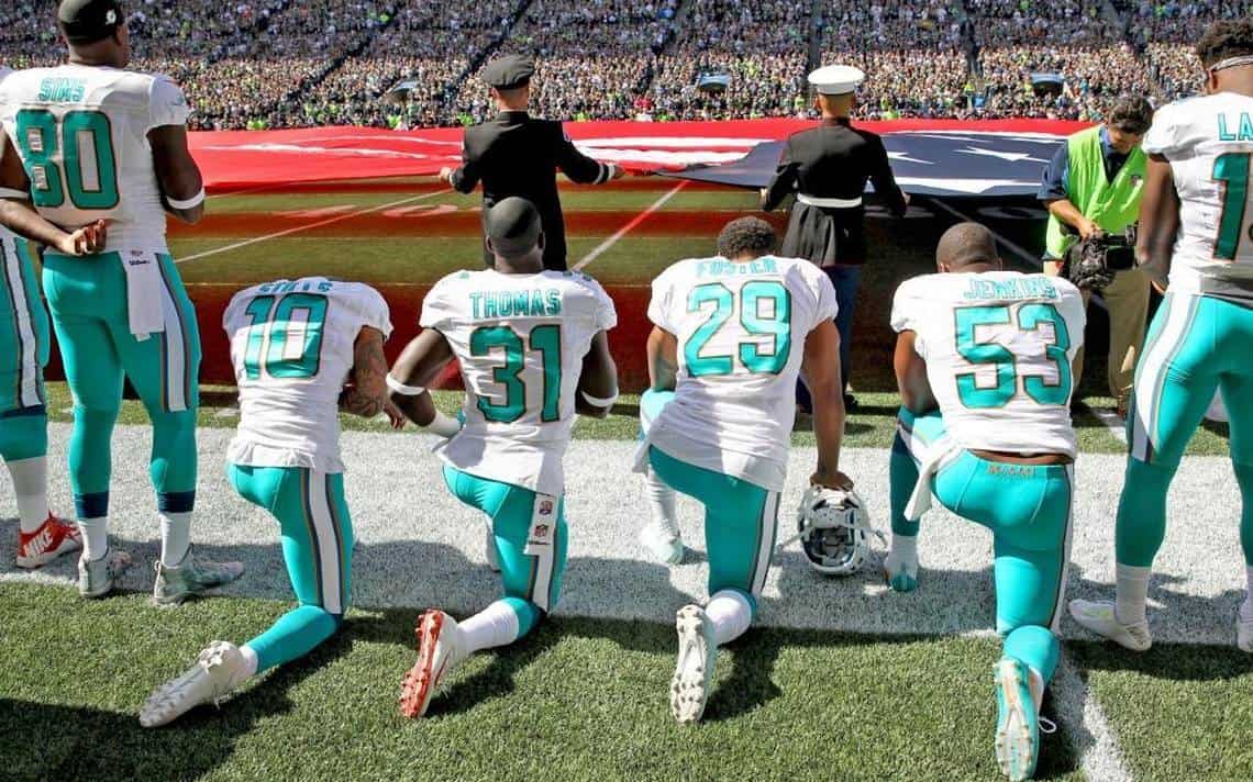 Miami Dolphins players kneel sept 11